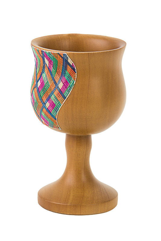 Light wood Reed Sea Elijah's cup with a vertical wavy panel of multicolor straw on one side