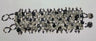 Vertical view of a wide open-weave bracelet in dark hematite and clear quartz chips