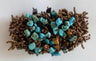 Stretch bracelet topped with turquoise and tiger's eye chips and bronze bead fringe