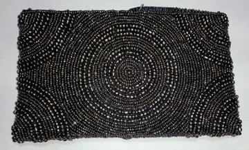 Pewter beaded clutch with a large central swirl and corner arcs of metallic beads