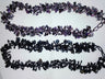 Two clustered bead necklaces on white; the upper purple amethyst and obsidian strand is this piece