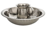 Hammered nickel wash cup with banded rings resting in a wide hammered basin