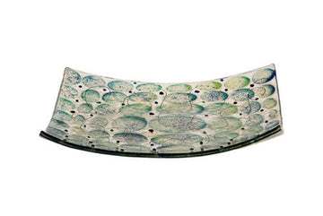 Curved square glass matzah plate patterned with overlapping blue and green circles