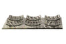 Black and grey grid-pattern glass Seder plate with six small curved dishes arranged on top