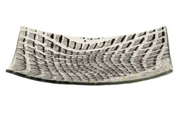 Curved square glass matzah plate with a black, grey and white woven-look grid pattern