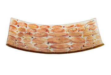 Curved square glass matzah plate with overlapping amber and orange circles and thin dark swirls