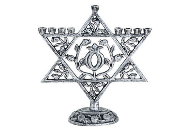 Silver metal Star of David shaped menorah with pomegranate openwork center on a round base
