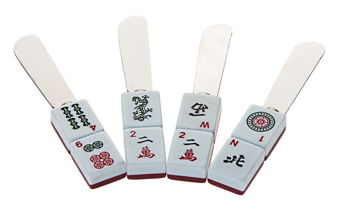 Four cheese spreaders with Mah Jongg tile handles in bam, dot, crak and wind designs
