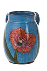 Turquoise stoneware wash cup painted with a large red poppy-style flower on a green stem