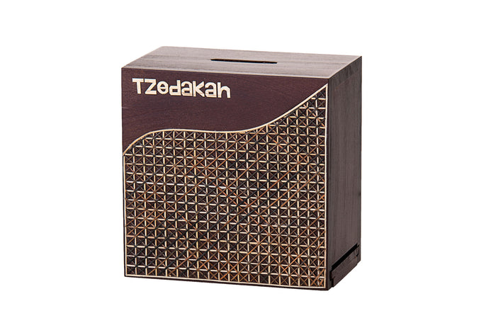 Dark wood tzedakah box with natural straw lattice inlay and the word Tzedakah above a curved border