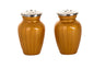Pair of gold enamel urn-shaped salt and pepper shakers with silver-tone perforated caps