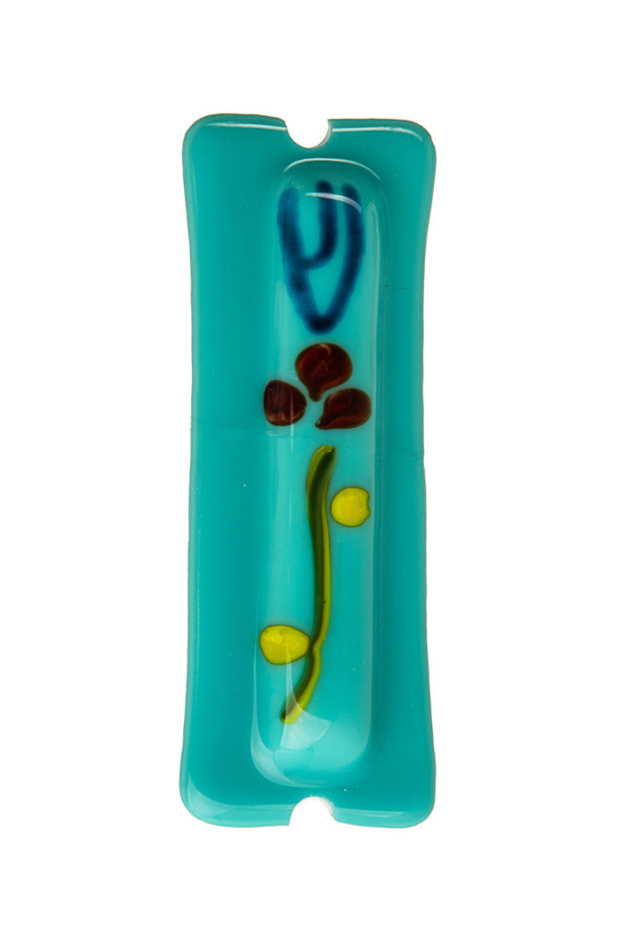 Turquoise glass mezuzah with a blue Shin over a red-petaled flower with yellow buds on a green stem