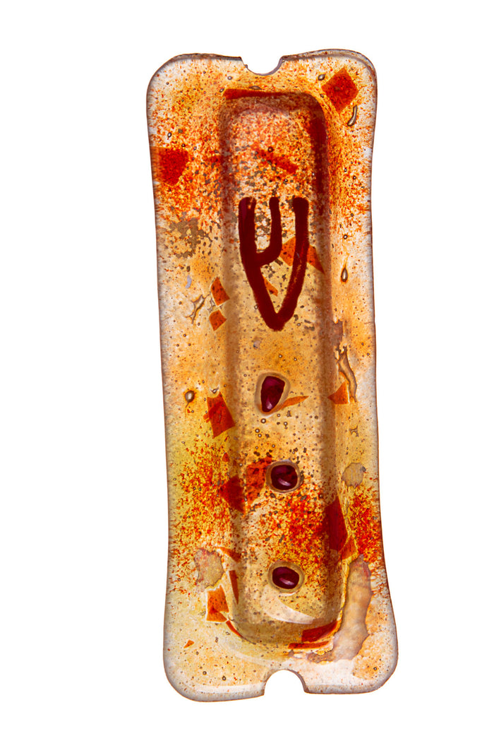 Speckled orange and amber glass mezuzah with a deep red Shin and dark red dots