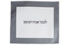 White vinyl challah cover framed in silver-grey with dark Hebrew lettering across the center