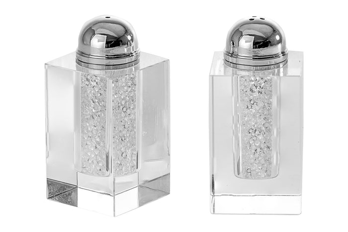 Crystal salt and pepper shakers with sparkling crushed-stone centers and polished domed tops