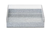 Square napkin holder with silver-tone textured base and clear Lucite walls