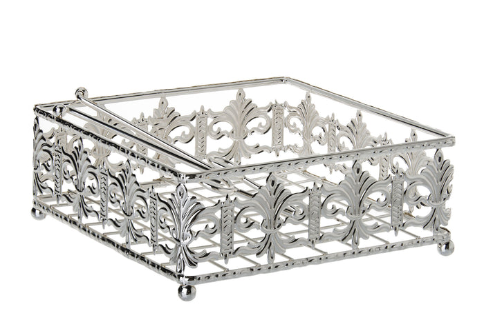 Square silver plated napkin holder with openwork scroll walls, ball feet and a top bar