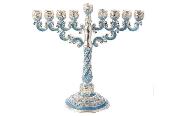 Light blue jeweled menorah with silver-tone scrolled arms and a twisted stem on a round base