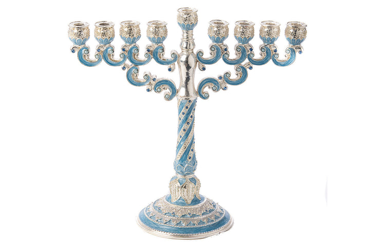 Light blue jeweled menorah with silver-tone scrolled arms and a twisted stem on a round base