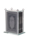 Clear crystal bencher holder with glitter-filled posts holding a row of grey hard cover benchers