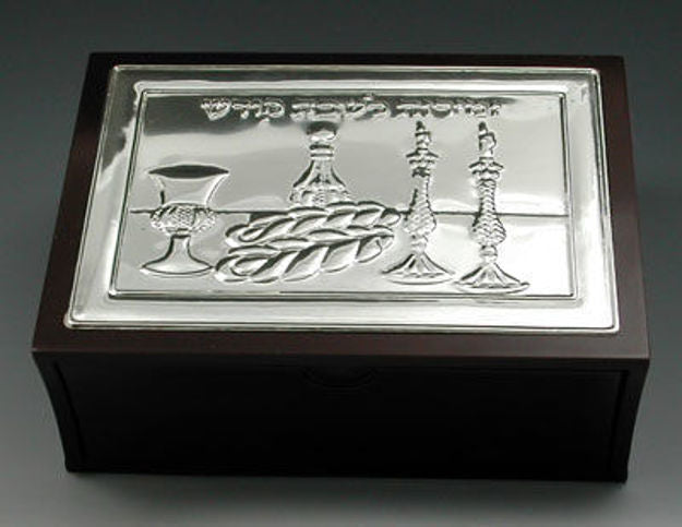 Dark wood bencher box with silver-tone lid showing Kiddush cup, challah and candlesticks