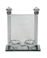 Crystal tea light candlestick with two faceted cups before an etched Hebrew blessing panel on a mirrored base