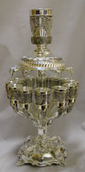 Tall silver plated twelve-cup wine fountain with grape-decorated cups circling the column on scrolled feet