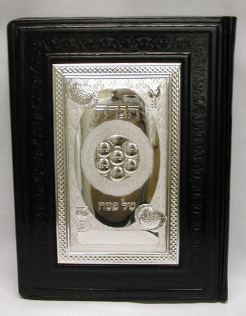 Black tooled leather Haggadah with sterling silver front plaque showing Hebrew title and Seder plate