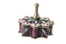 Burgundy enamel star-shaped dreidel with red and clear stones and a bronze-tone stem