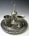 Matte pewter Havdalah set with Jerusalem-relief cup, spice tower with flag and candle holder on a round plate