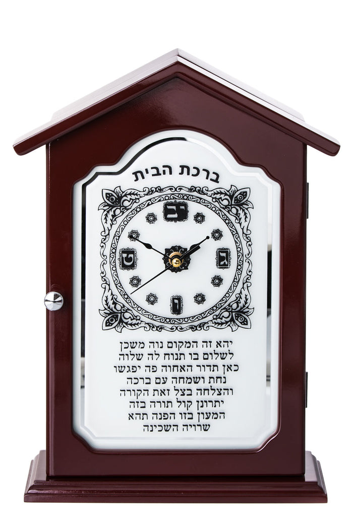 House-shaped wood key hanger clock with a clock dial above the Hebrew Birkat HaBayit blessing on a white panel