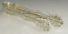 Silver plated ice tong with scrolled openwork arms and fan-shaped grips