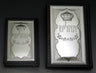 Two leather Tehillim with sterling silver crown covers, a smaller and a larger size side by side