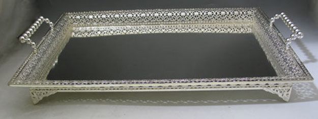 Silver plated tray with pierced openwork gallery walls and bead-bar handles, viewed from an angle