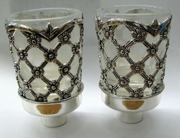 Two neronim holders with silver-tone X lattice and flower studs around clear cups