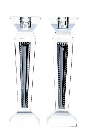 Crystal and sterling candlestick standing upright, tapering to a single candle socket