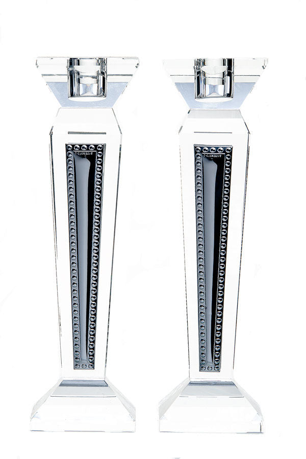 Crystal and sterling candlestick standing upright, tapering to a single candle socket