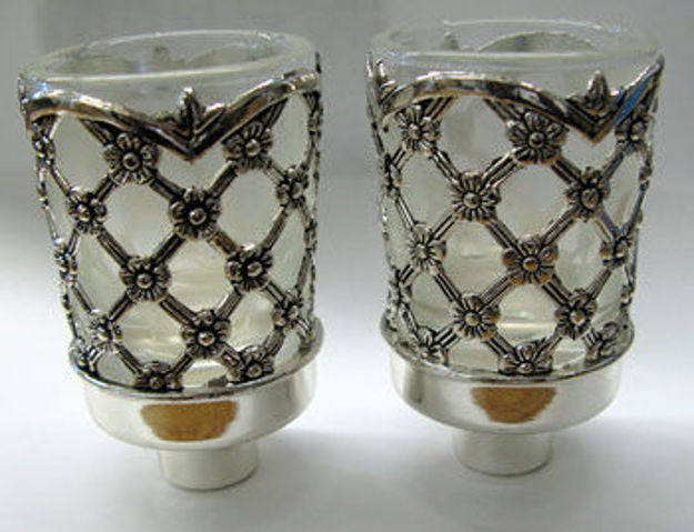 Front view of the X design neronim pair showing peg bases below the lattice holders