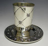 Silver plated Kiddush cup with engraved lattice and rose medallions on a matching flower-rimmed tray