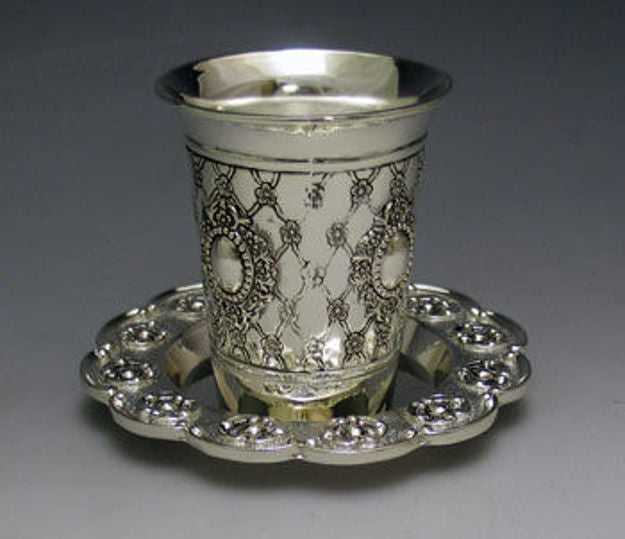 Silver plated stemless Kiddush cup with lattice and medallion pattern in a scalloped tray