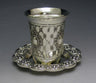 Silver plated stemless Kiddush cup with lattice and medallion pattern in a scalloped tray