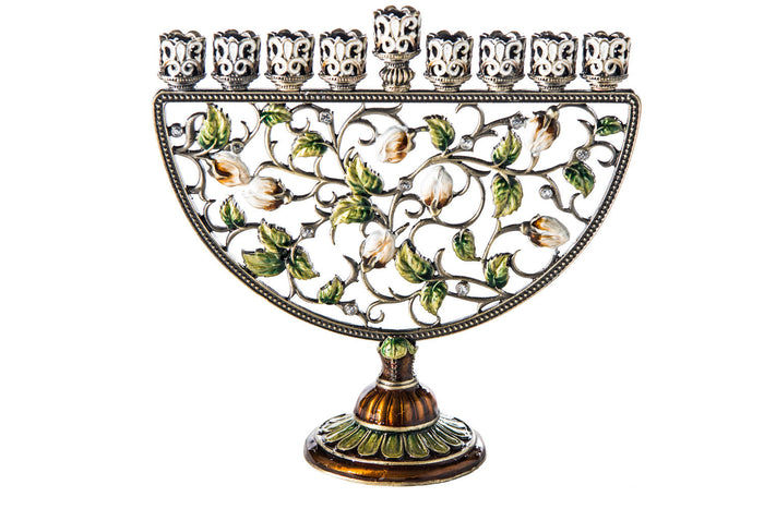 Half-moon jeweled menorah with openwork vines, green leaves, cream buds and a pedestal base