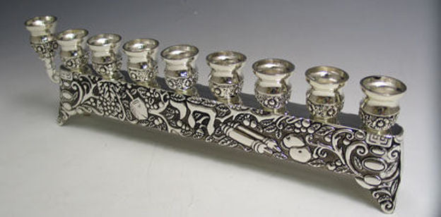 Low silver plated row menorah with nine cups, a raised end shamash and a relief-decorated base