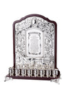 Wall style menorah with dark wood back, silver plated floral panel, Hebrew text and nine cups along the base
