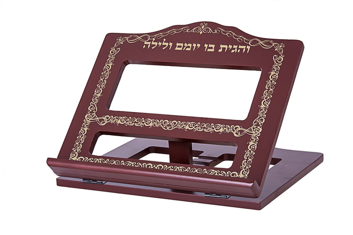 Burgundy wooden book holder with gold Hebrew verse and scroll border, shown angled on a hinged base