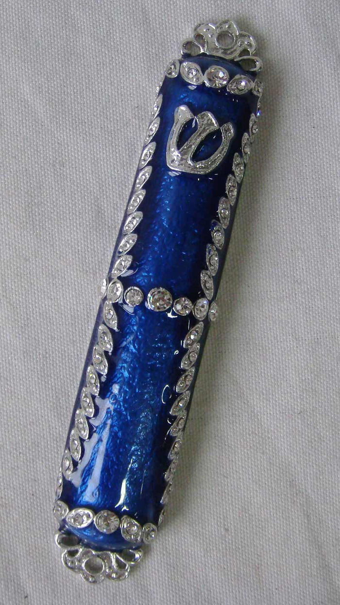 Deep blue enamel mezuzah case crossed by silver-tone vine borders set with clear stones