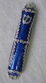 Deep blue enamel mezuzah case crossed by silver-tone vine borders set with clear stones
