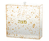 Lucite matzah box filled with gold flakes, gold Hebrew Matzah lettering and a clear knob