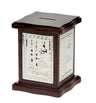 Square dark wood tzedakah box with embossed silver plated side panels and a coin slot in the scalloped top