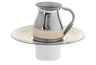Polished steel Mayim Achronim pitcher with cream enamel band on a basin with ribbed enamel rim